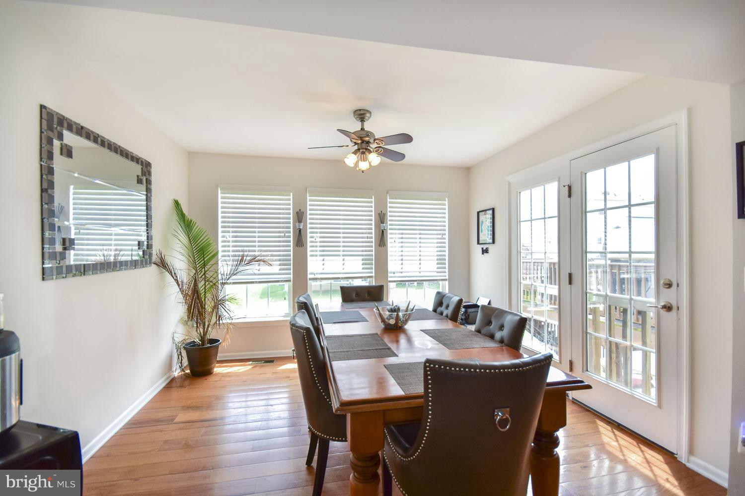 1240 Steed Street Ranson, WV 25438 - Photo 5 of 30 a view of a dining room with furniture window and outside view