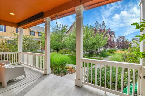 a view of a porch with a furniture