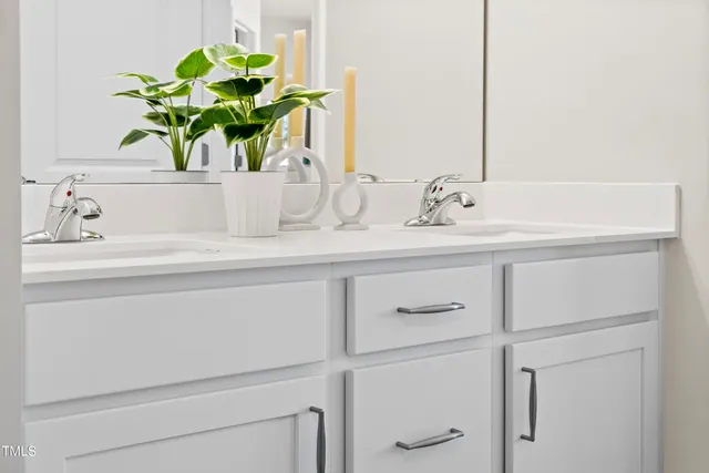 a park with lots of multi story residential apartment building in the back