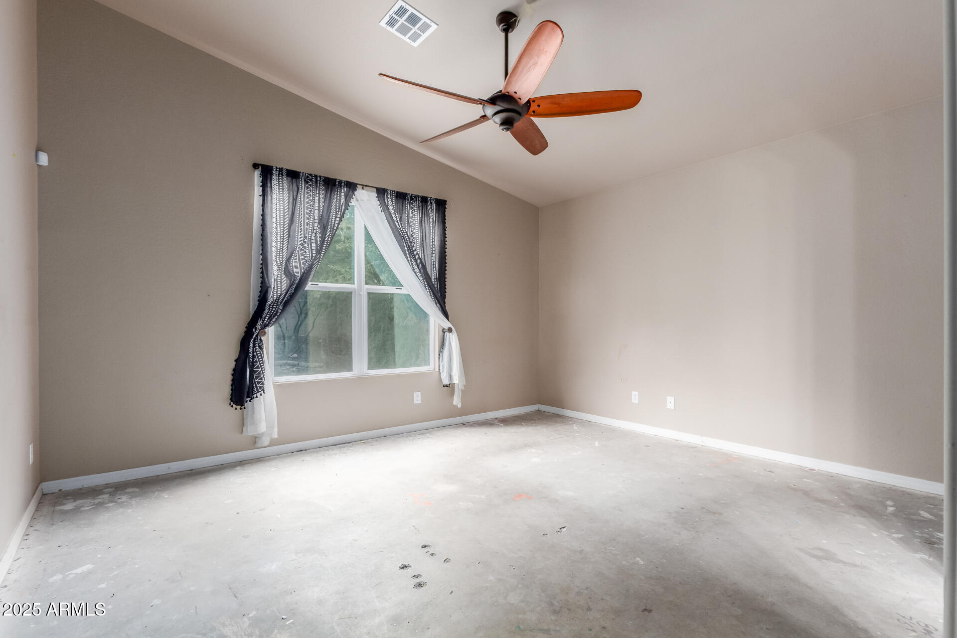 20768 West Hamilton Street Buckeye, AZ 85396 - Photo 14 of 33 an empty room with windows and fan