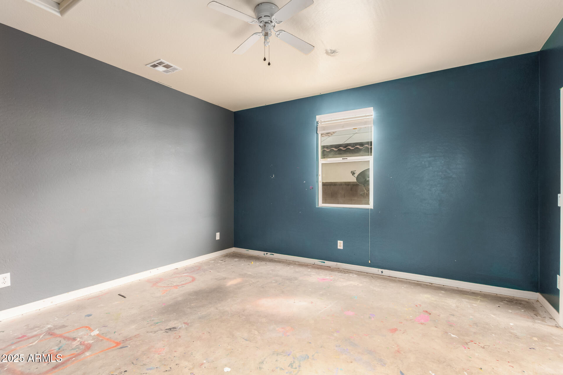 20768 West Hamilton Street Buckeye, AZ 85396 - Photo 21 of 33 a view of an empty room with a window