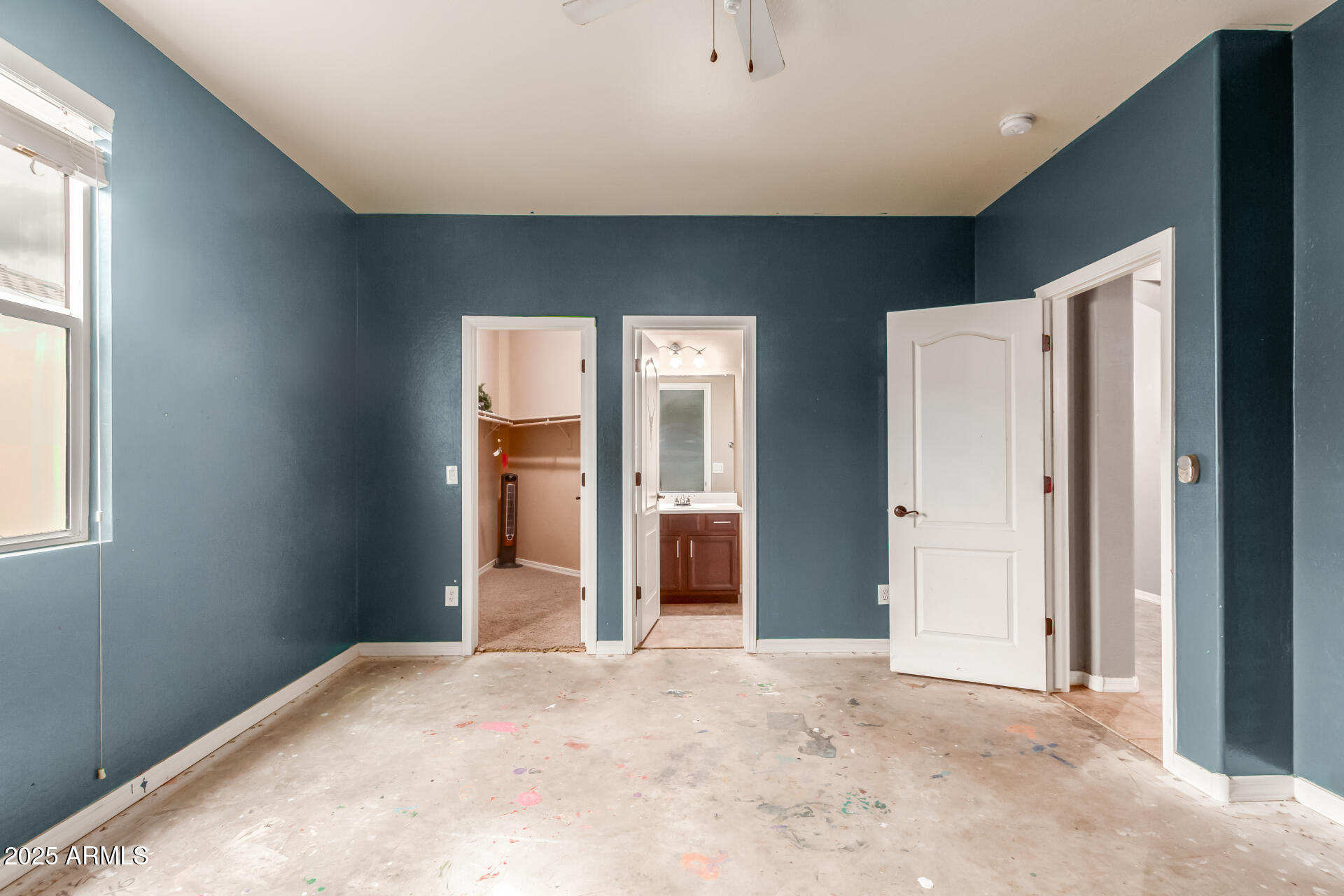 20768 West Hamilton Street Buckeye, AZ 85396 - Photo 22 of 33 an empty room with windows and closet