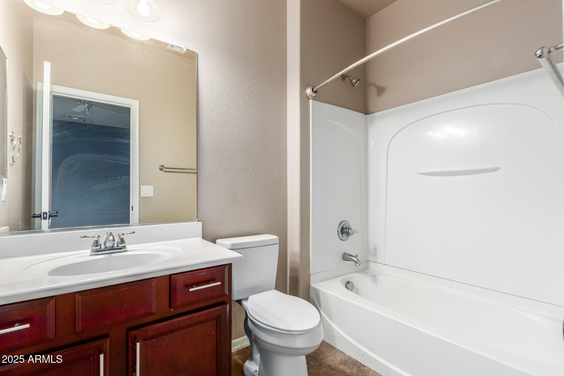 20768 West Hamilton Street Buckeye, AZ 85396 - Photo 23 of 33 a bathroom with a sink a toilet and a bathtub