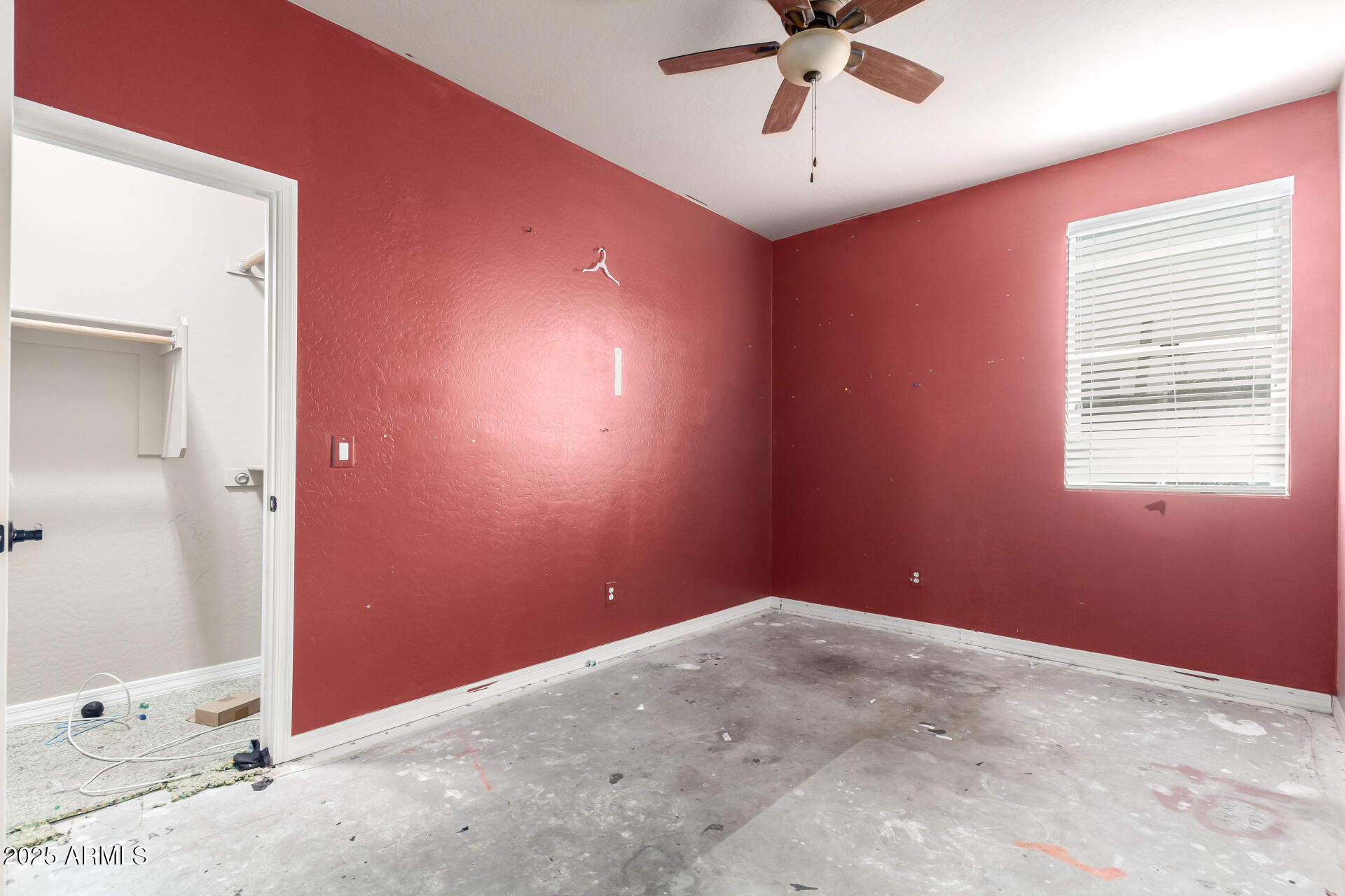 20768 West Hamilton Street Buckeye, AZ 85396 - Photo 25 of 33 a view of a livingroom with a ceiling fan and window