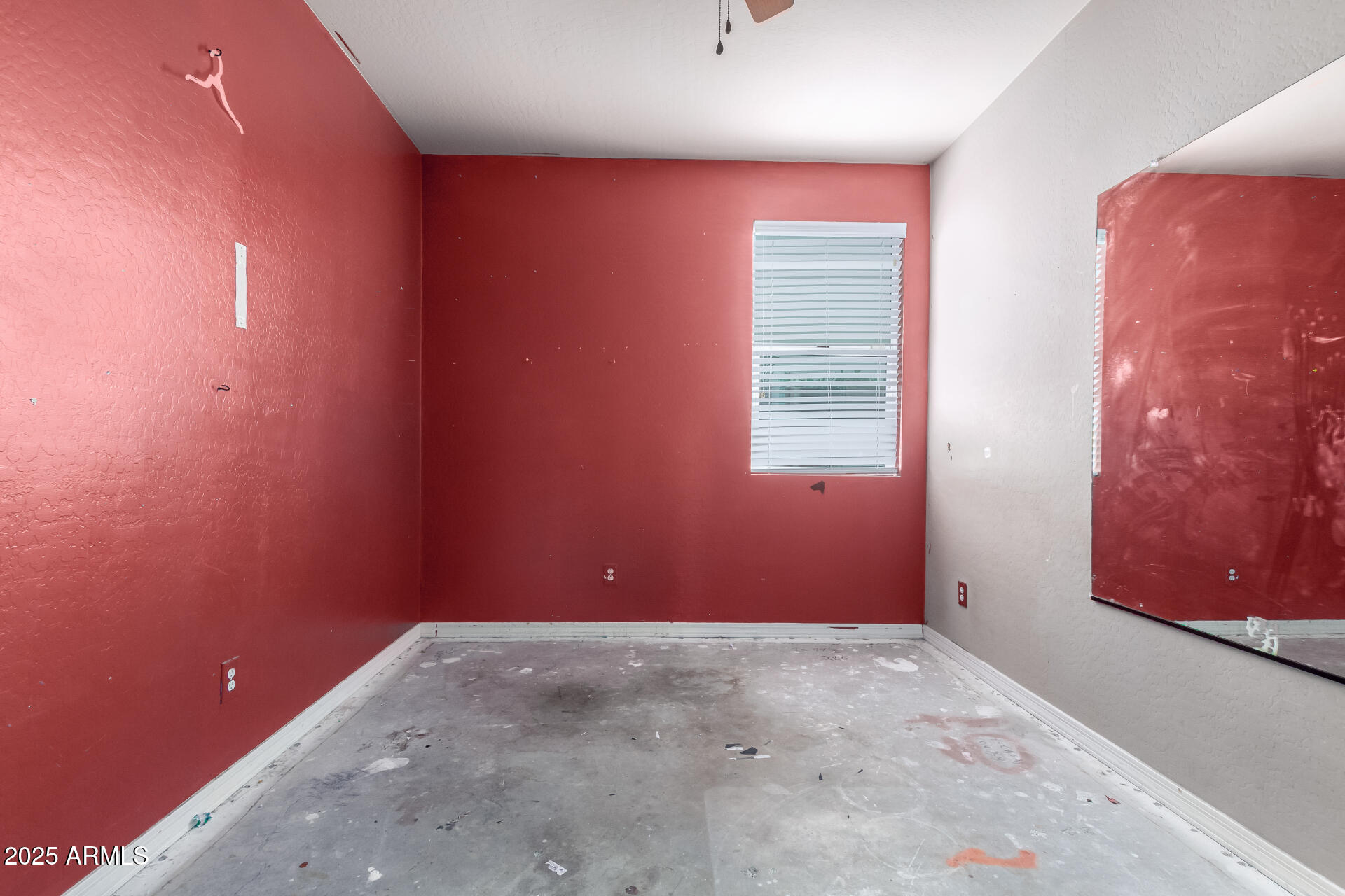 20768 West Hamilton Street Buckeye, AZ 85396 - Photo 26 of 33 an empty room with windows