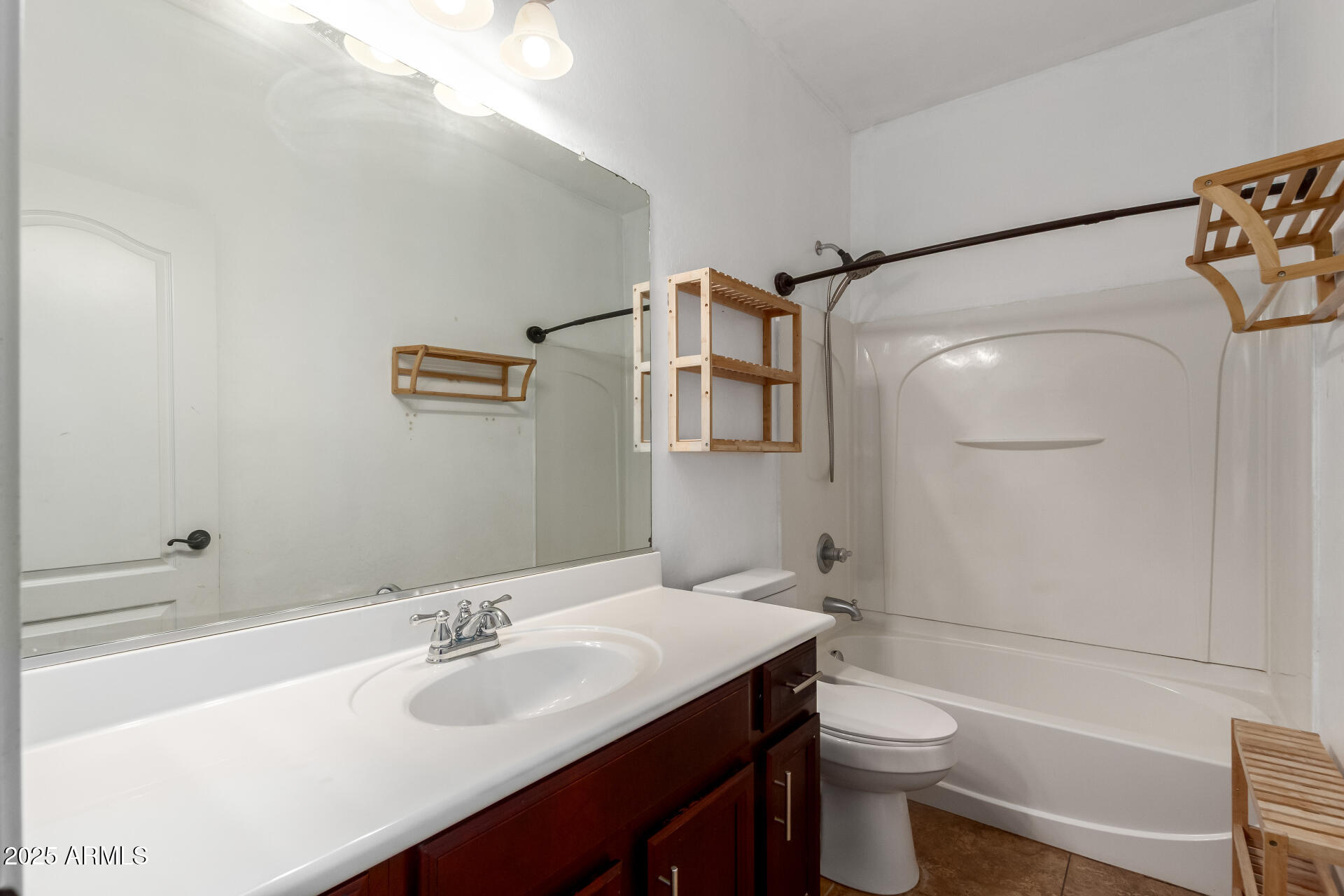 20768 West Hamilton Street Buckeye, AZ 85396 - Photo 27 of 33 a bathroom with a sink toilet and shower