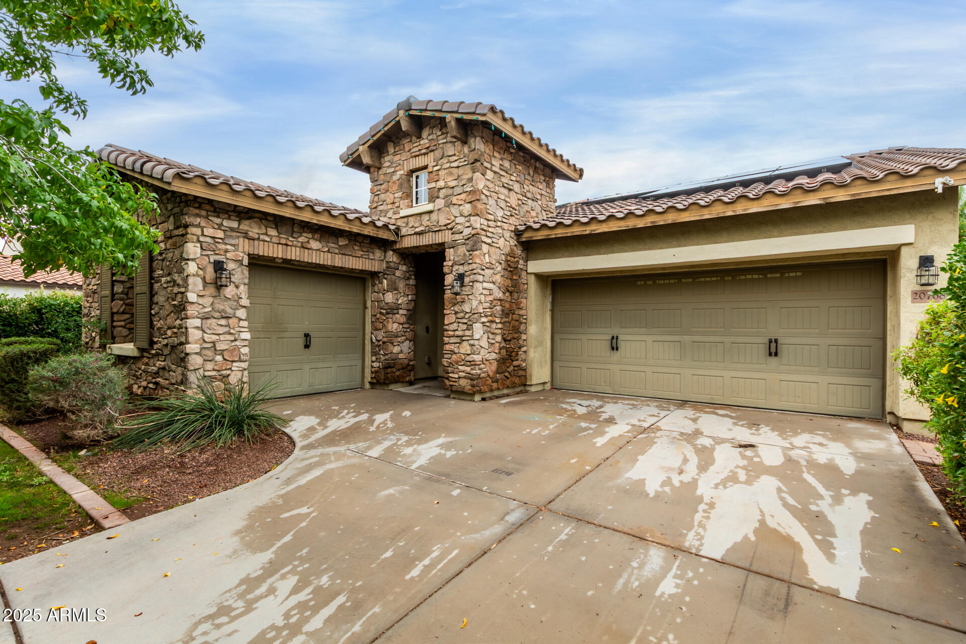 20768 West Hamilton Street Buckeye, AZ 85396 - Photo 4 of 33 a front view of a house with a garage