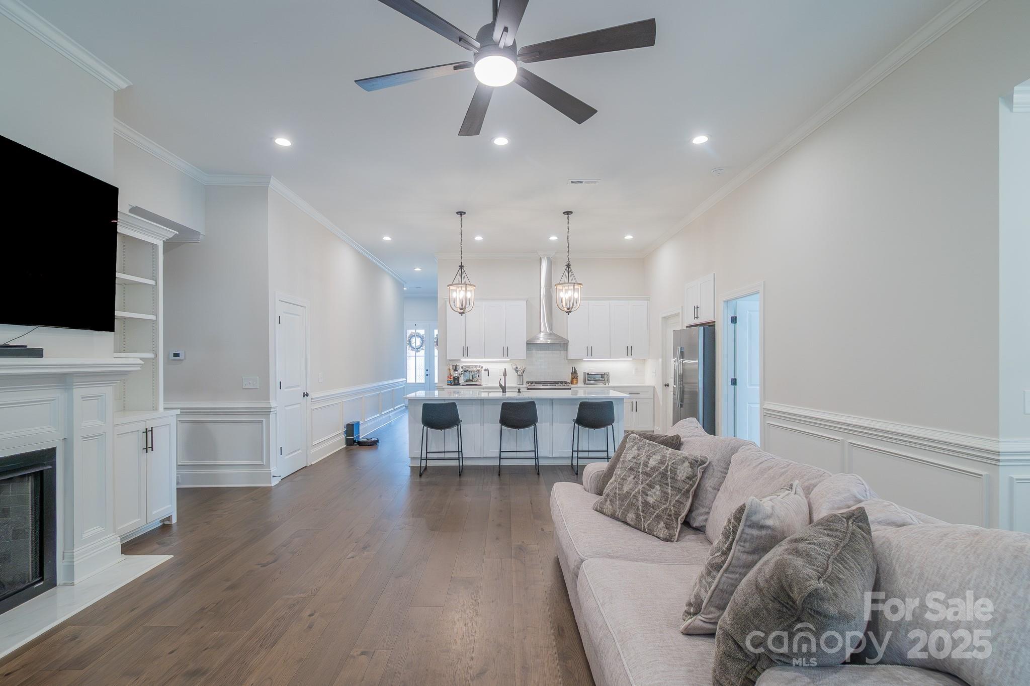 994 Cedar Crest Lane Florence, SC 29501 - Photo 14 of 42 a living room with furniture and a flat screen tv