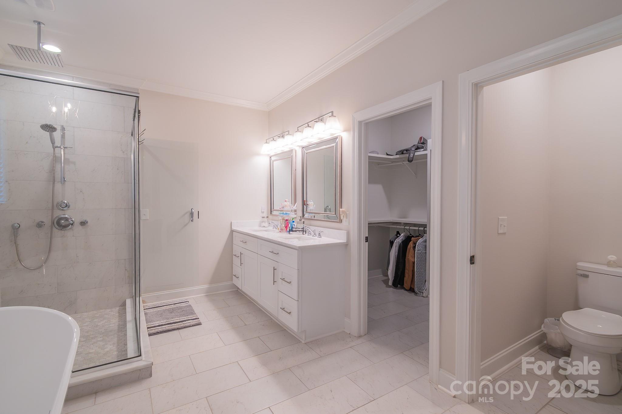 994 Cedar Crest Lane Florence, SC 29501 - Photo 21 of 42 a bathroom with a sink a toilet and shower