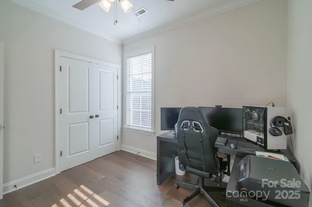 a workspace with chandelier