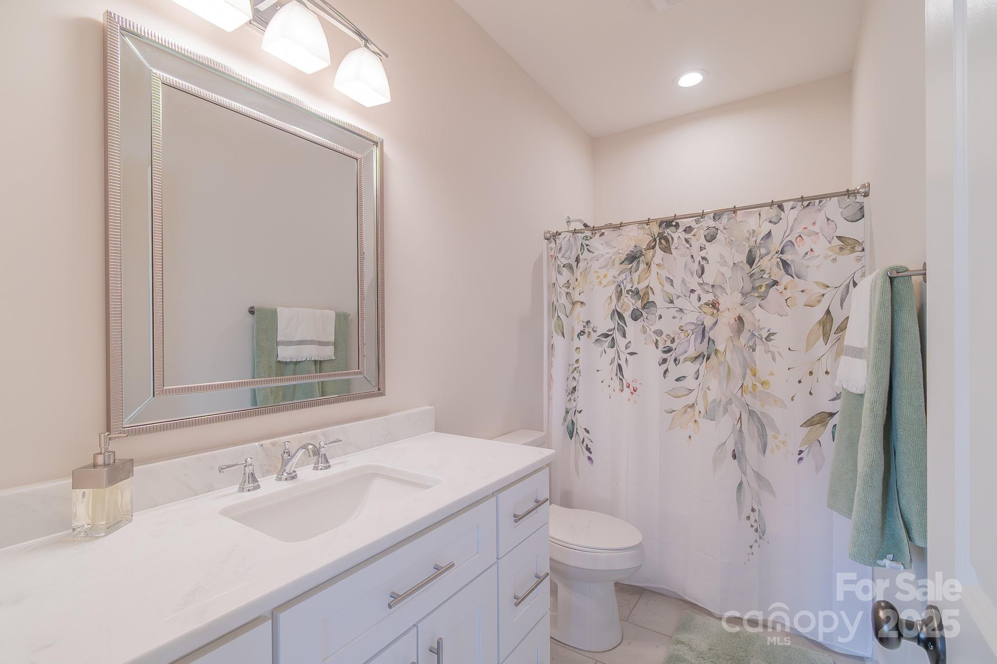 994 Cedar Crest Lane Florence, SC 29501 - Photo 31 of 42 a bathroom with a sink toilet and shower