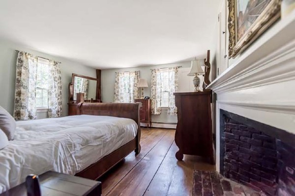 109 Holt Road Andover, MA 01810 - Photo 24 of 30 a bedroom with a bed dresser and a large window