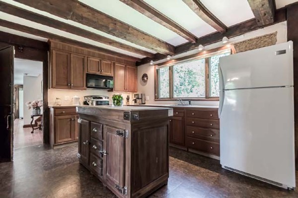 109 Holt Road Andover, MA 01810 - Photo 8 of 30 a kitchen with stainless steel appliances granite countertop a refrigerator a stove a sink and a microwave