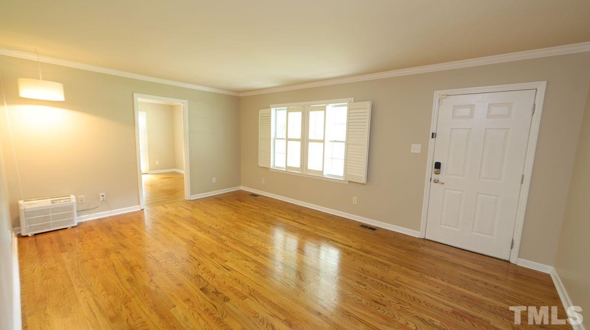 3421 Coley Road Durham, NC 27703 - Photo 6 of 30 Hardwoods in living room and family room. Large living room with great space for furniture.