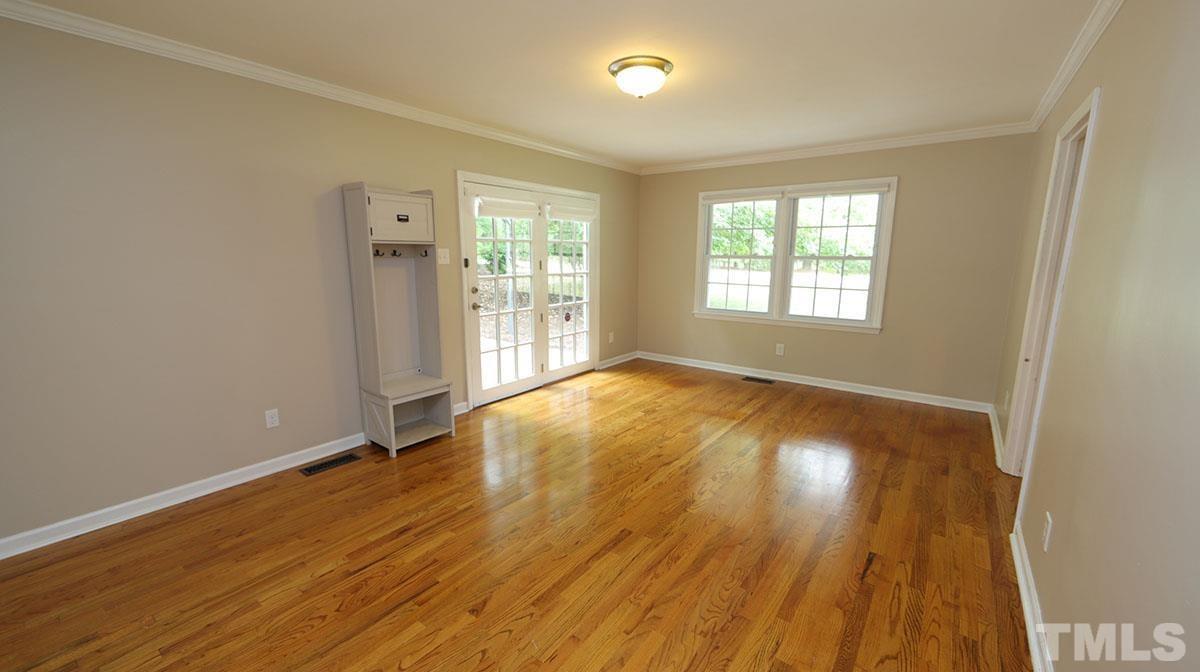 3421 Coley Road Durham, NC 27703 - Photo 8 of 30 Flex space- can be used as additional family room, dining room, office space, play room, workout space.