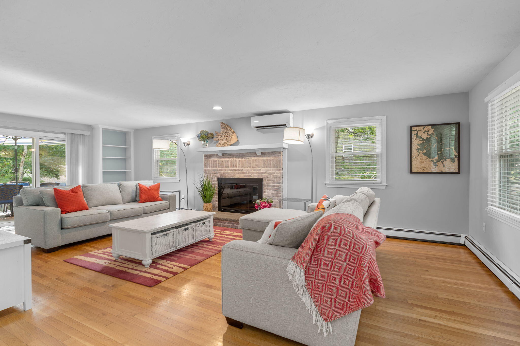 104 Pond Circle Mashpee, MA 02649 - Photo 12 of 29 a living room with furniture and a fireplace