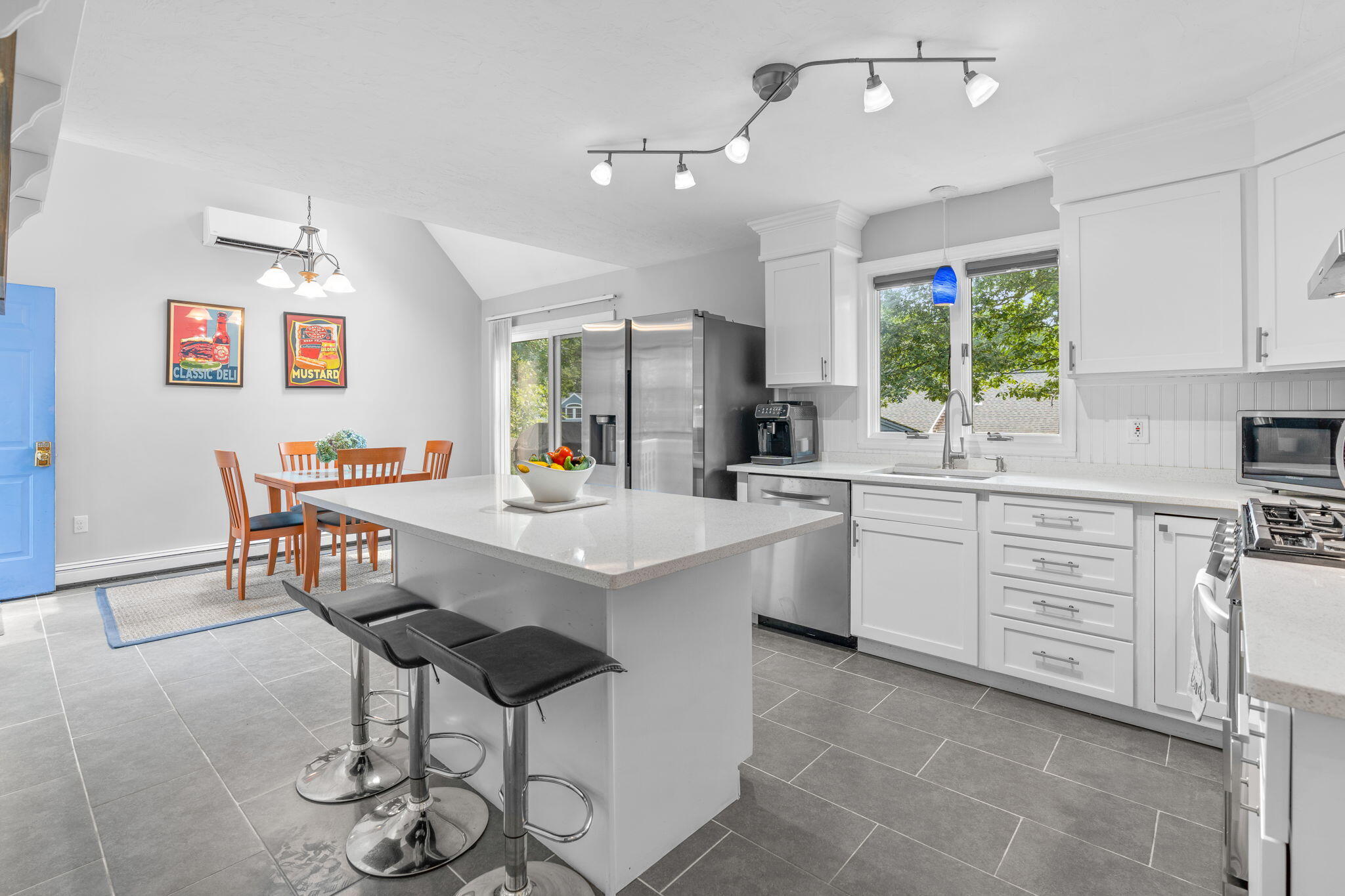 104 Pond Circle Mashpee, MA 02649 - Photo 16 of 29 a kitchen with cabinets a sink and appliances