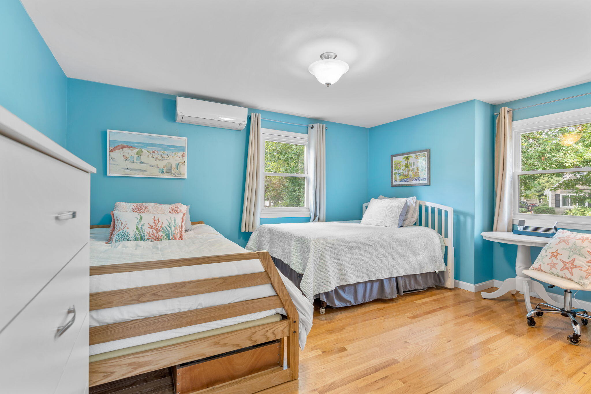 104 Pond Circle Mashpee, MA 02649 - Photo 21 of 29 a bedroom with two beds and a large window