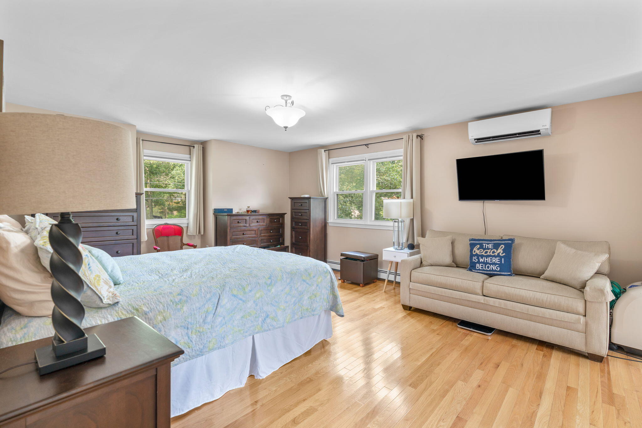 104 Pond Circle Mashpee, MA 02649 - Photo 23 of 29 a living room with furniture and a flat screen tv
