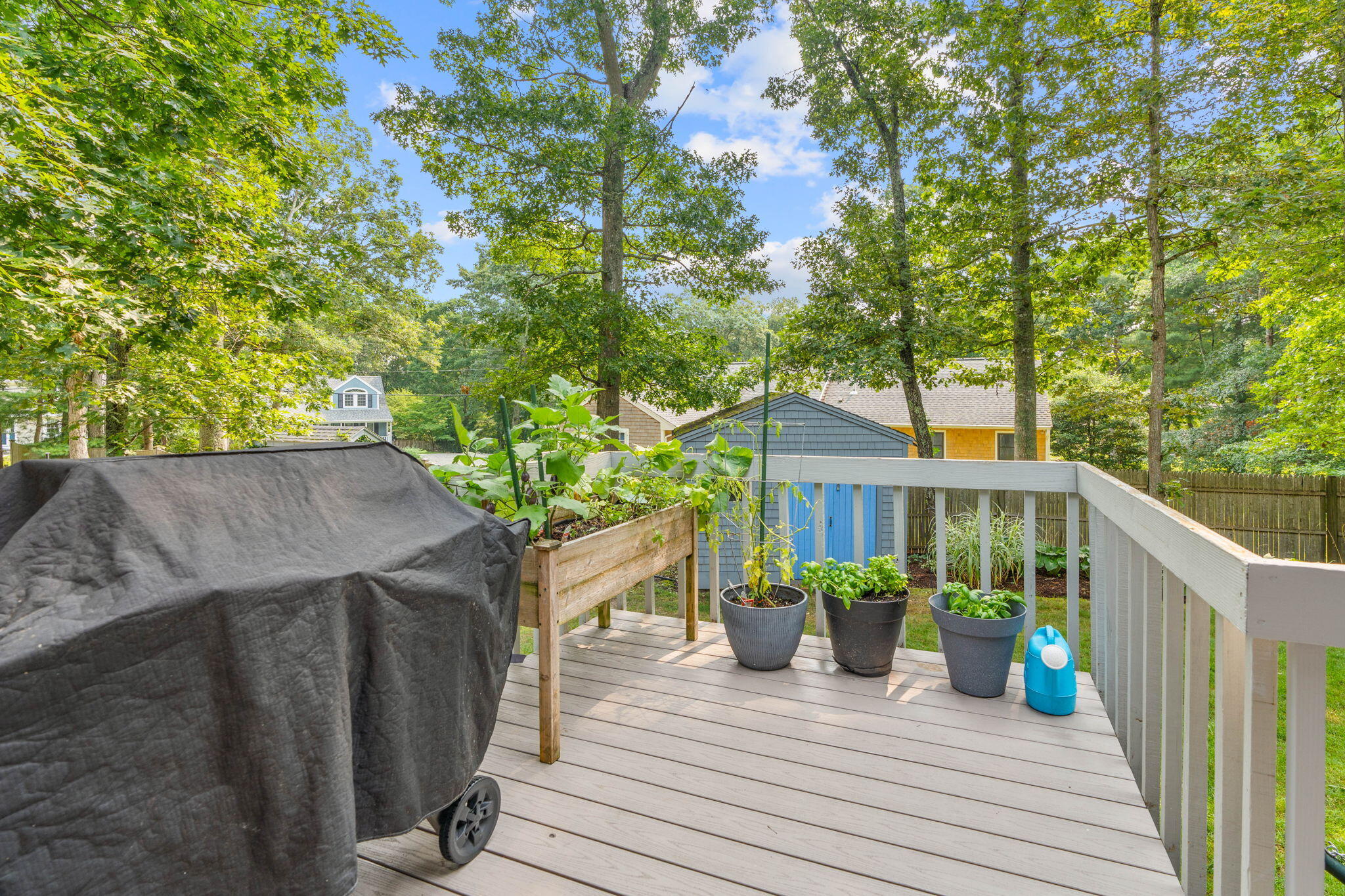 104 Pond Circle Mashpee, MA 02649 - Photo 7 of 29 a view of a house with a deck
