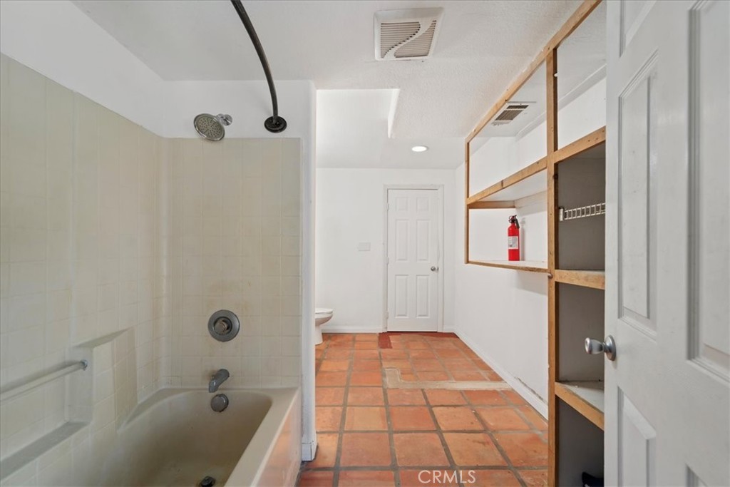 39875 Bautista Road Anza, CA 92539 - Photo 21 of 44 a bathroom with a bathtub and shower