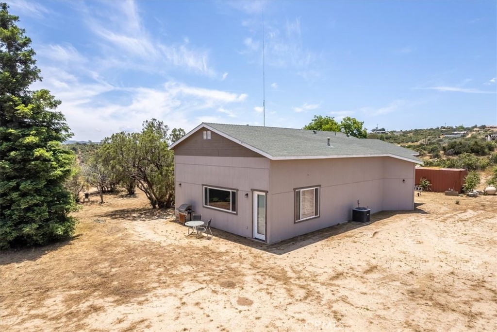 39875 Bautista Road Anza, CA 92539 - Photo 23 of 44 a view of a house with a snow in the yard