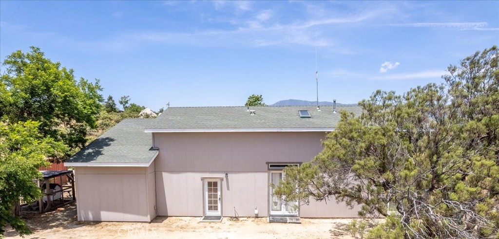 39875 Bautista Road Anza, CA 92539 - Photo 25 of 44 a front view of a house with a yard