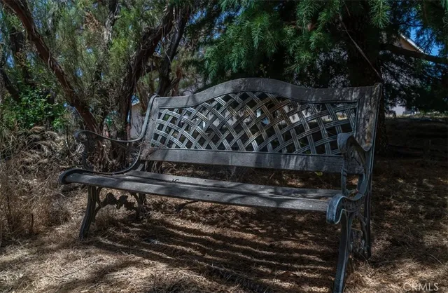 a view of a porch with a tree