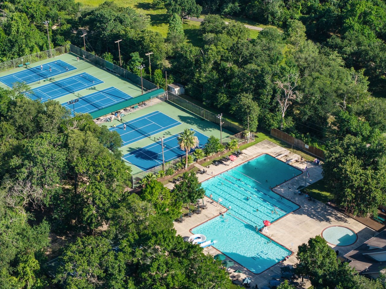 14219 Apple Tree Road Houston, TX 77079 - Photo 32 of 33 Arial of Nottingham Forest Club: Pool, Tennis/Pickleball Courts, 2 Playgrounds, lighted Basketball court and Clubhouse available to rent.