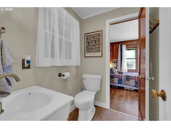 a bathroom with a sink toilet and tub