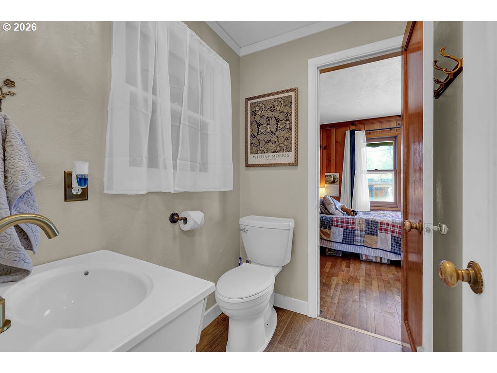 1355 Juniper Street Junction City, OR 97448 - Photo 19 of 45 a bathroom with a sink toilet and tub