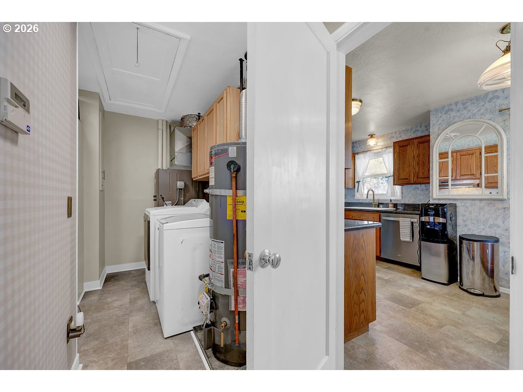 1355 Juniper Street Junction City, OR 97448 - Photo 20 of 45 a kitchen with a refrigerator and a sink