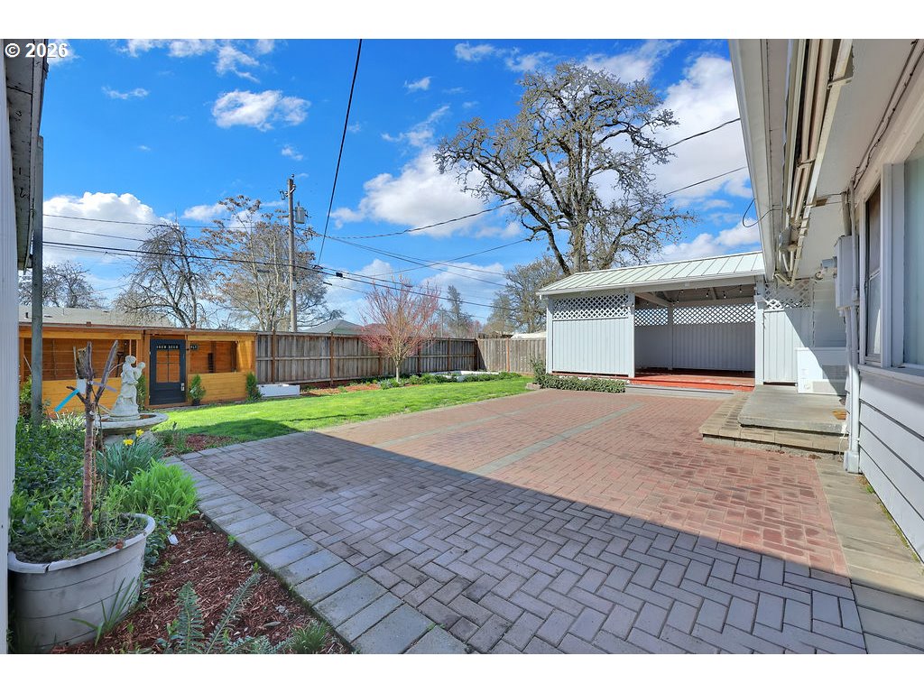 1355 Juniper Street Junction City, OR 97448 - Photo 34 of 45 a front view of a house with a yard and potted plants