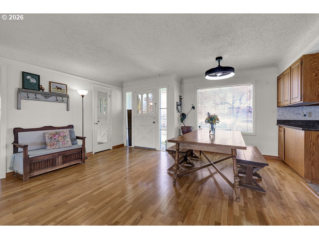 1355 Juniper Street Junction City, OR 97448 - Photo 5 of 45 a living room with furniture and wooden floor