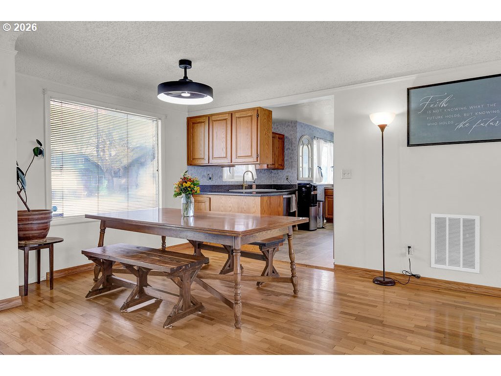 1355 Juniper Street Junction City, OR 97448 - Photo 9 of 45 a living room with furniture and a wooden floor