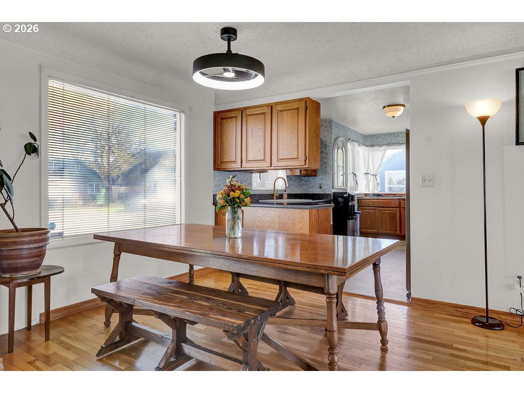 1355 Juniper Street Junction City, OR 97448 - Photo 10 of 45 a view of a dining room with furniture and window