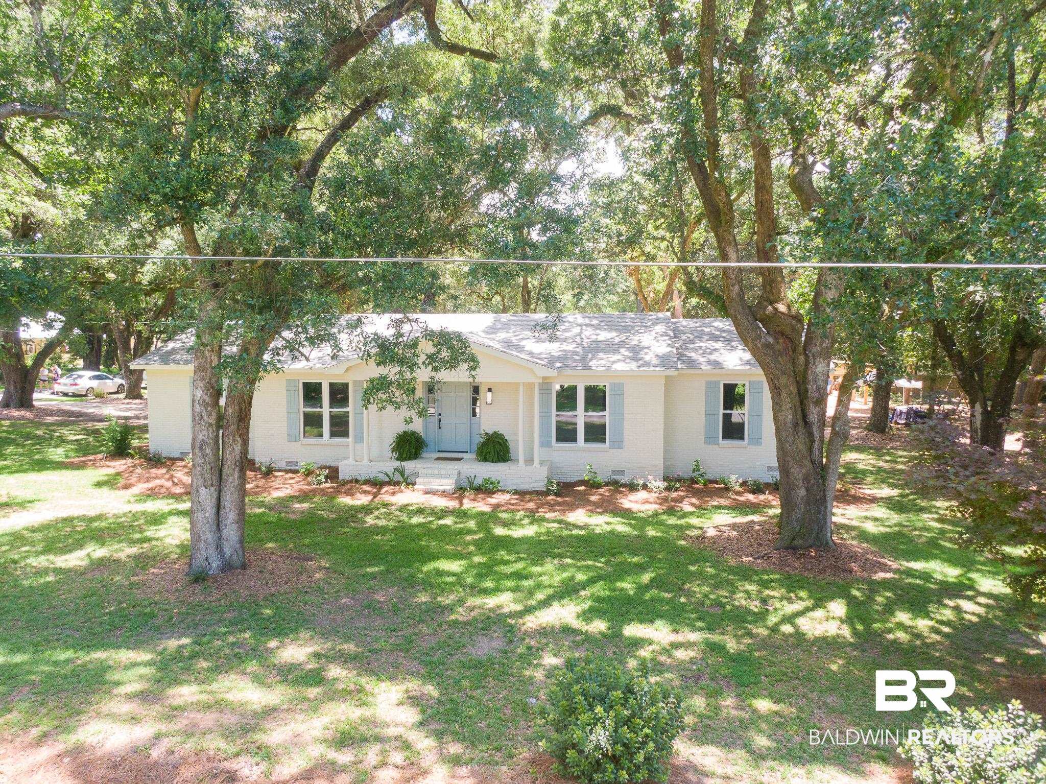 12190 Pecan Grove Street Magnolia Springs, AL 36555 - Photo 42 of 45 Ranch-style home featuring a front lawn