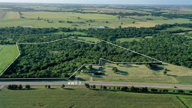 a view of a field with a park