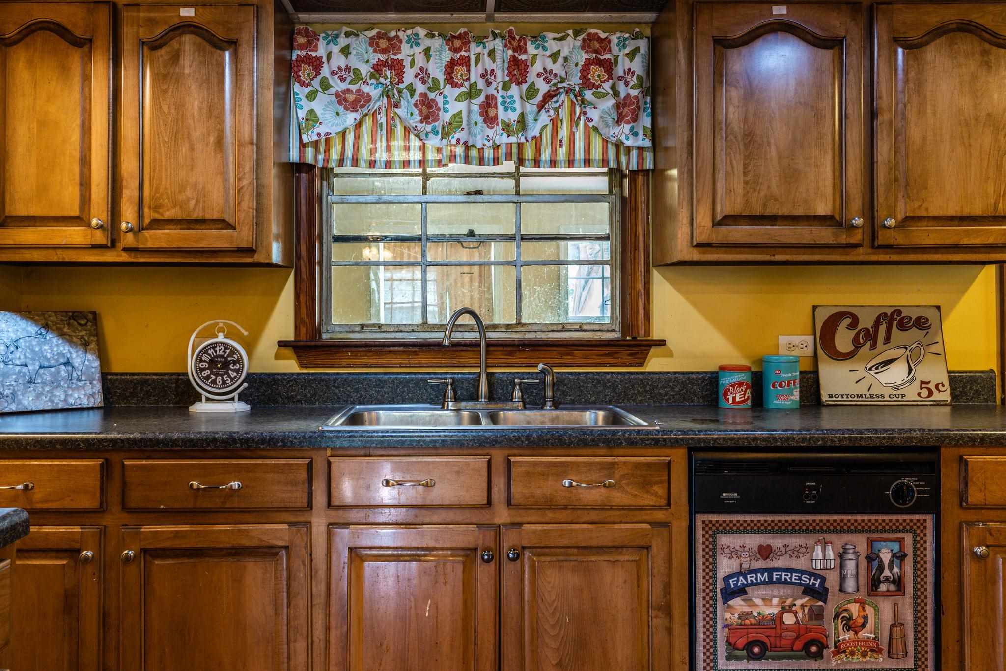 1762 Mt Torrey Road Lyndhurst, VA 22952 - Photo 13 of 46 a kitchen with stainless steel appliances granite countertop a stove and a microwave