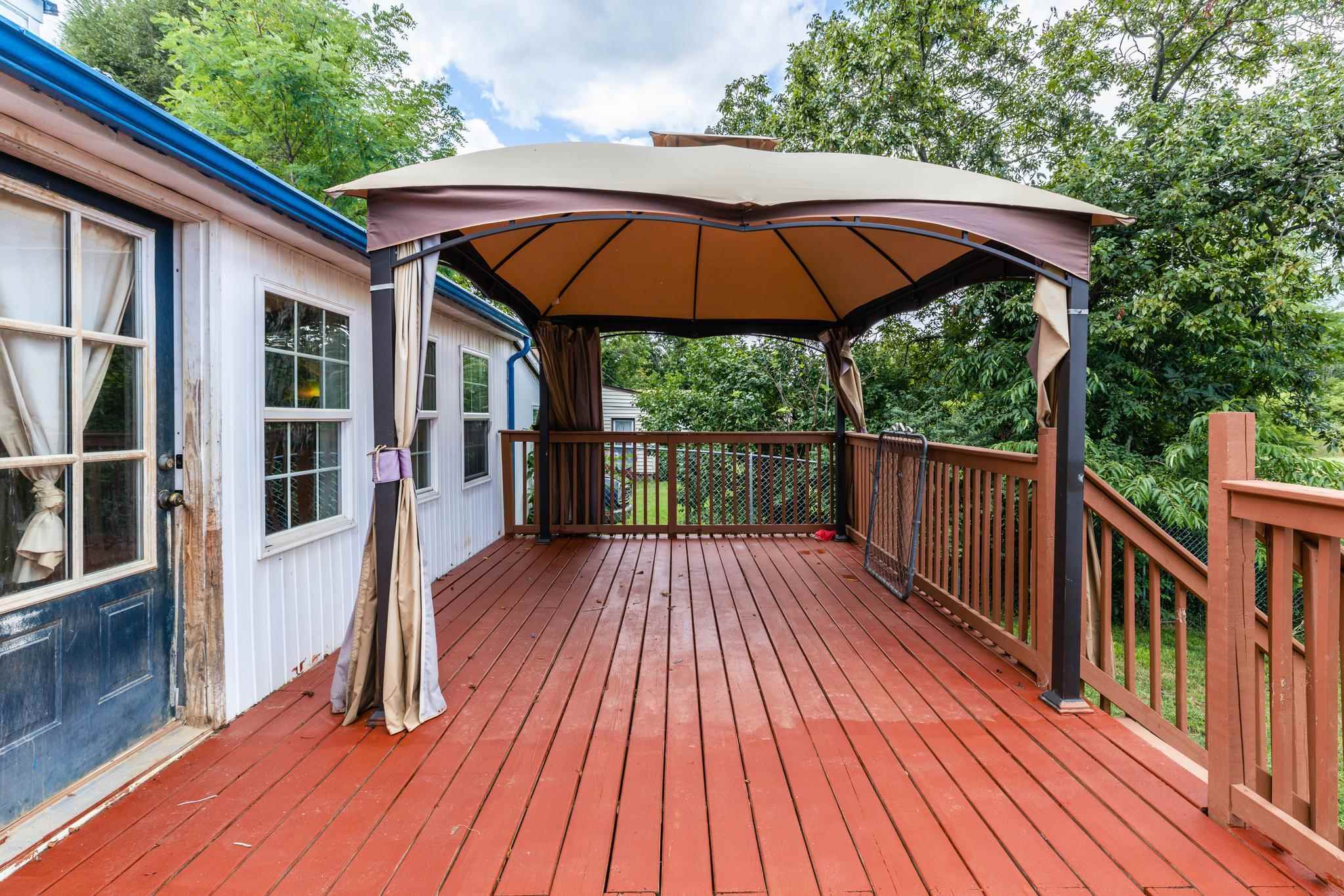 1762 Mt Torrey Road Lyndhurst, VA 22952 - Photo 33 of 46 a view of backyard with small deck and wooden floor