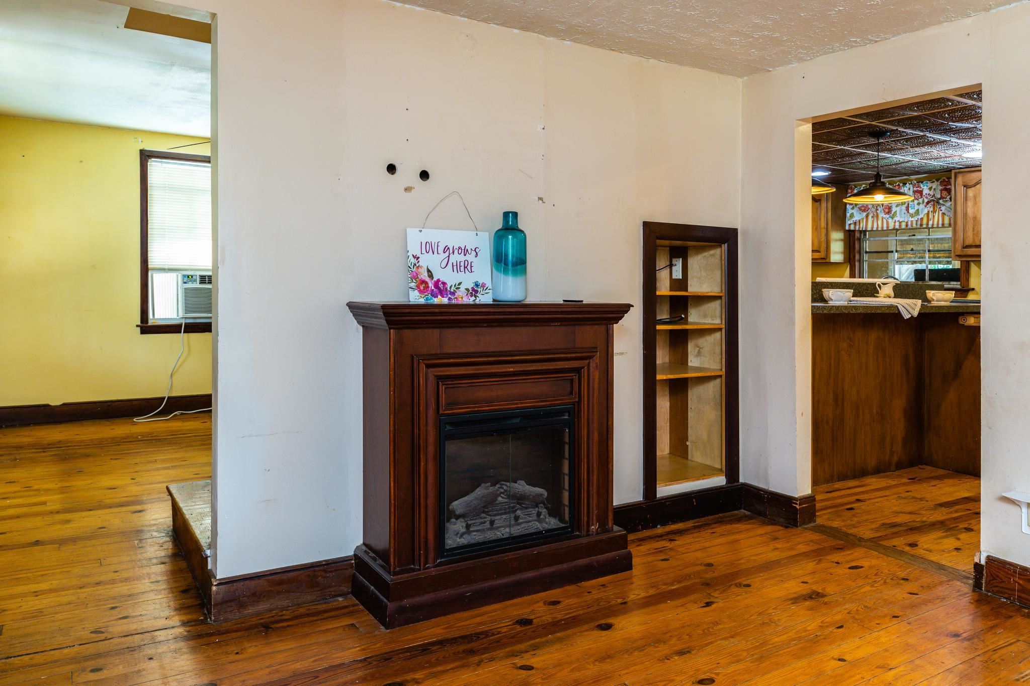 1762 Mt Torrey Road Lyndhurst, VA 22952 - Photo 8 of 46 a living room with furniture and a fireplace