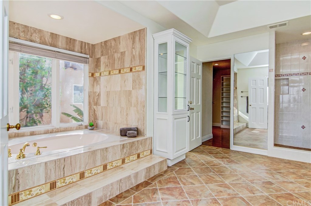 30 Coronado Pointe Laguna Niguel, CA 92677 - Photo 27 of 50 master bathroom with large tub and walk-in shower