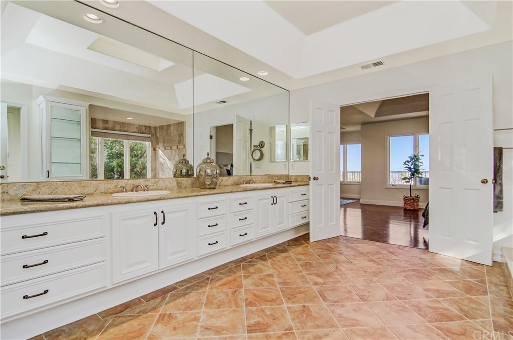 30 Coronado Pointe Laguna Niguel, CA 92677 - Photo 30 of 50 master bathroom with large tub and walk-in shower