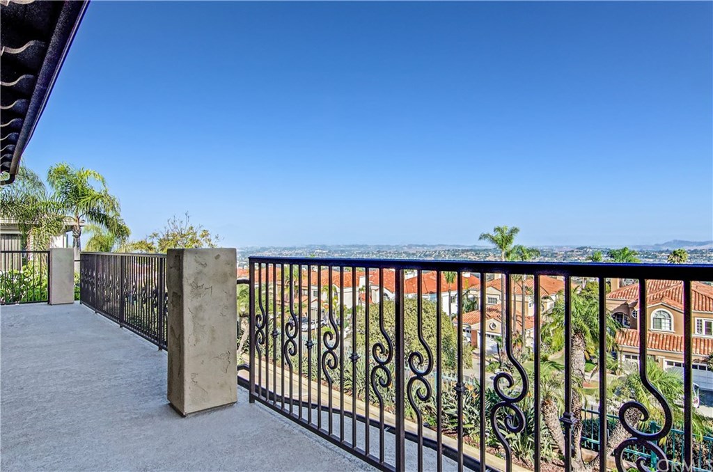 30 Coronado Pointe Laguna Niguel, CA 92677 - Photo 35 of 50 expanded deck runs the length of the rear of the home