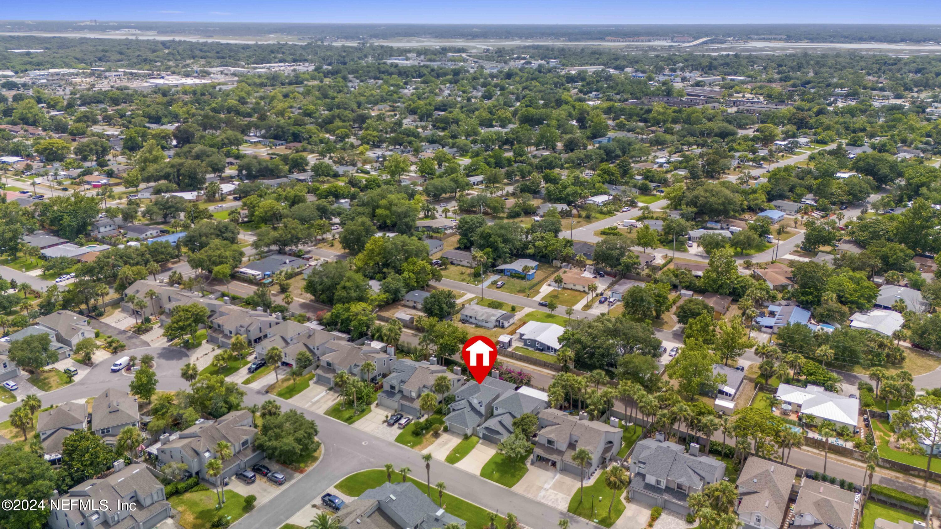 587 Selva Lakes Circle Atlantic Beach, FL 32233 - Photo 25 of 31 an aerial view of house with yard and mountain view in city