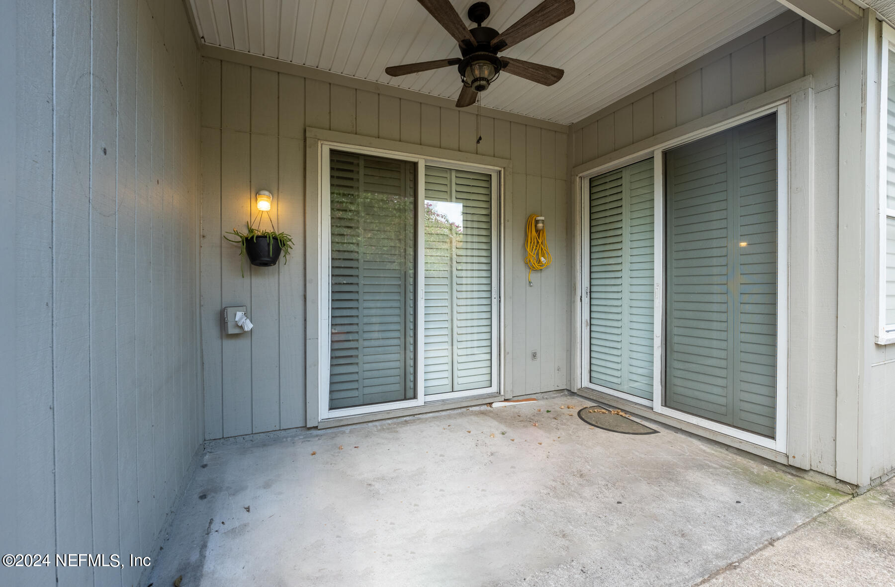 587 Selva Lakes Circle Atlantic Beach, FL 32233 - Photo 26 of 31 wooden floor and window in an empty room