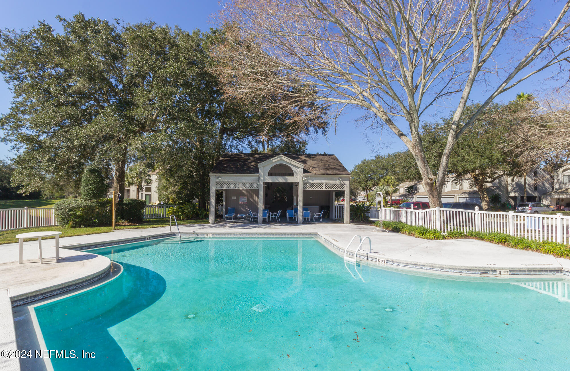 587 Selva Lakes Circle Atlantic Beach, FL 32233 - Photo 31 of 31 a view of a house with swimming pool and sitting area