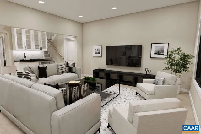 a living room with furniture and a flat screen tv