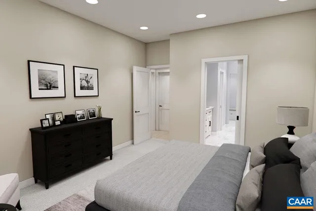 a bedroom with a bed and a painting on the wall