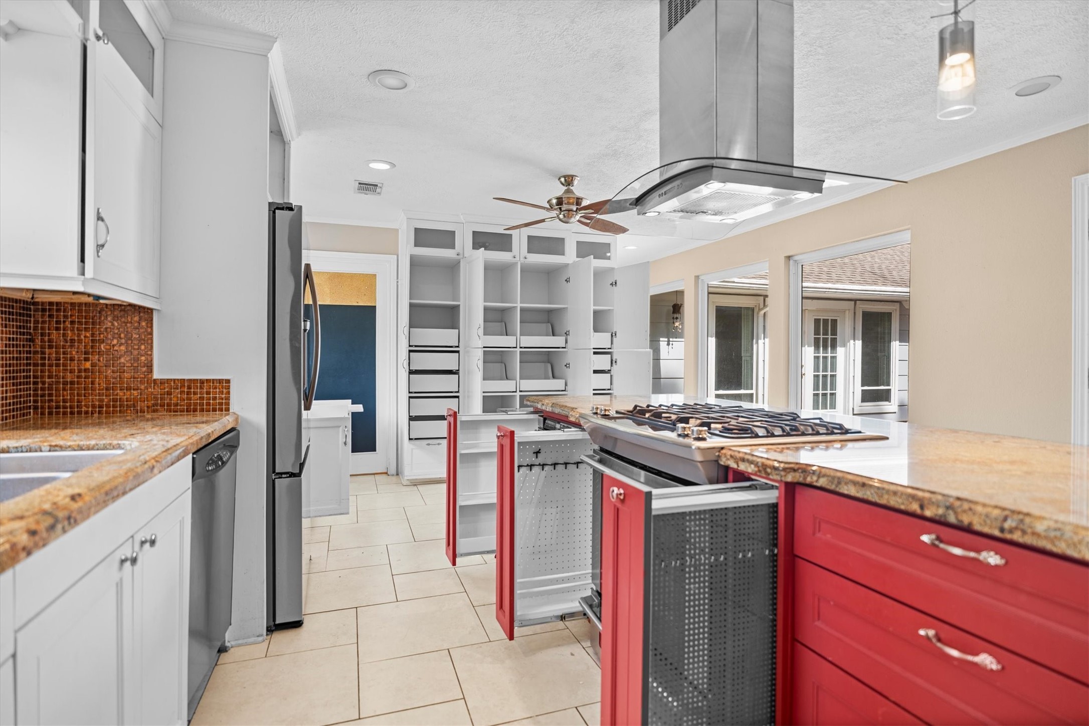 25319 Old Carriage Lane Spring, TX 77373 - Photo 7 of 35 a kitchen with stainless steel appliances granite countertop a stove and a refrigerator